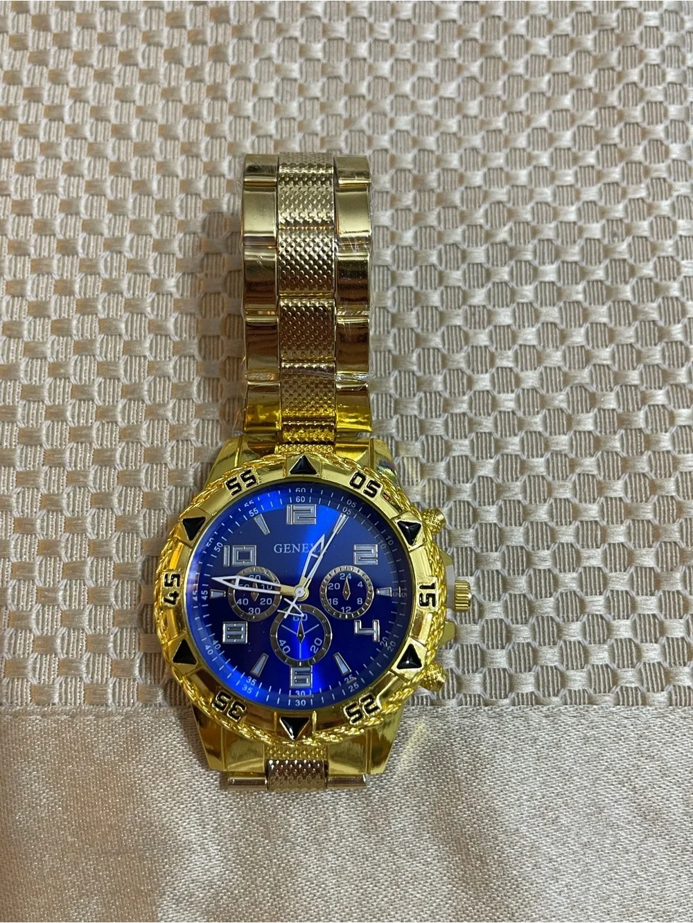 Geneva Gold Tone Watch with Blue Dial and Black Accents